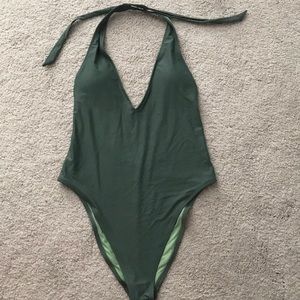 Green deep plunge one piece bathing suit
